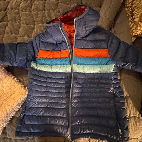 Cotopaxi Woman’s Puffer Jacket in Blue with Orange and Light Blue Accents - Picture 3 of 5